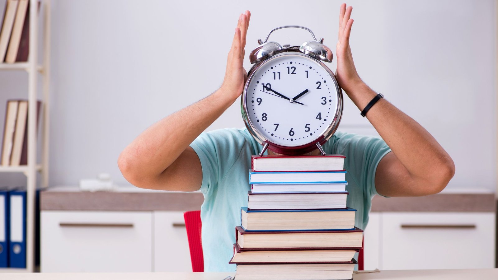 A young child overwhelmed by study time, with an alarm clock on a stack of math books
