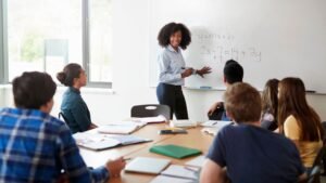 Tutor supporting students with SAT preparation